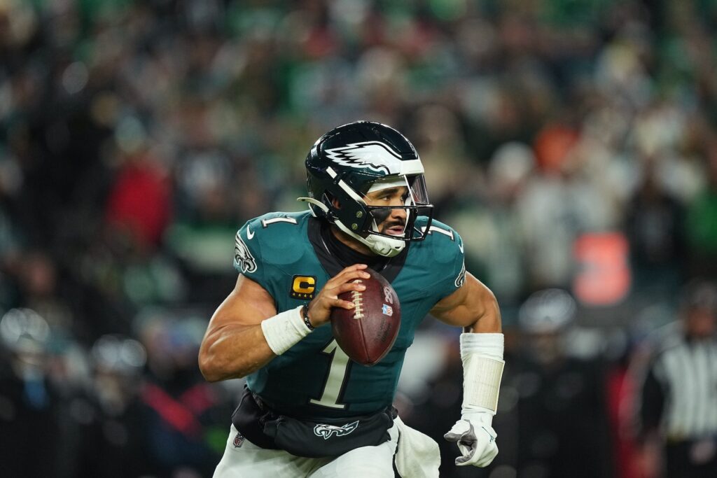 Philadelphia Eagles quarterback Jalen Hurts runs the ball
