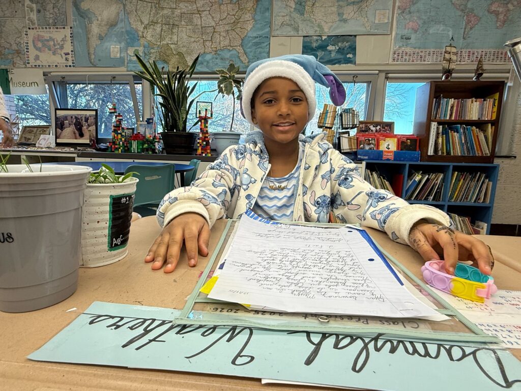 mcvey-elementary-school-delaware-wetlands-2026-12 A fourth grader sits at a desk with a letter about wetland protections at Joseph M. McVey Elementary School in Newark, Delaware