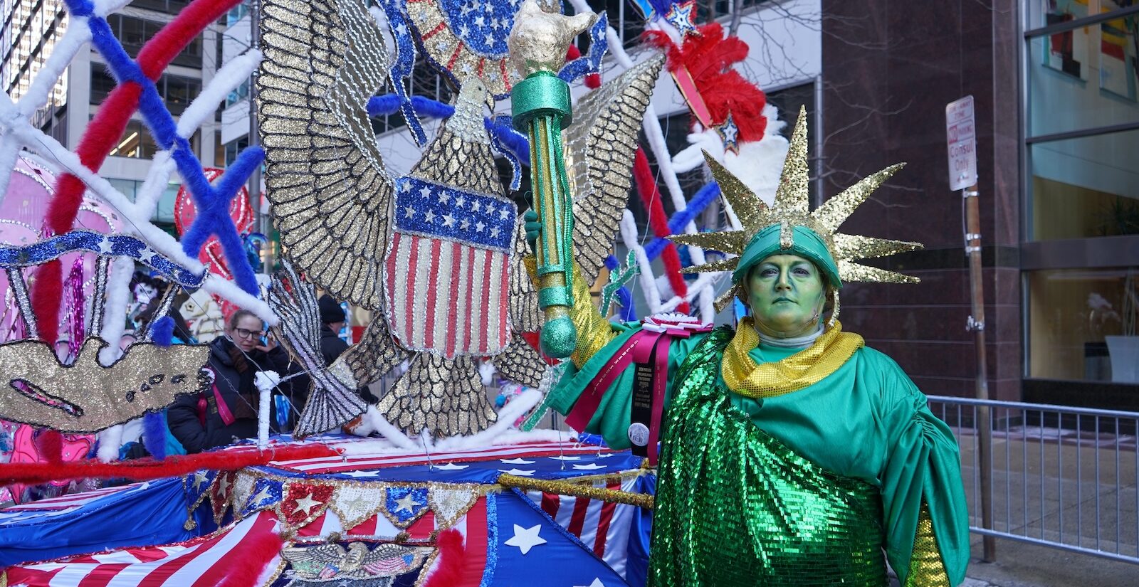 Golden Sunrise member and tour guide Jennifer Hensel with her Statue of Liberty-themed costume at the 2026 Mummers Parade in Philadelphia