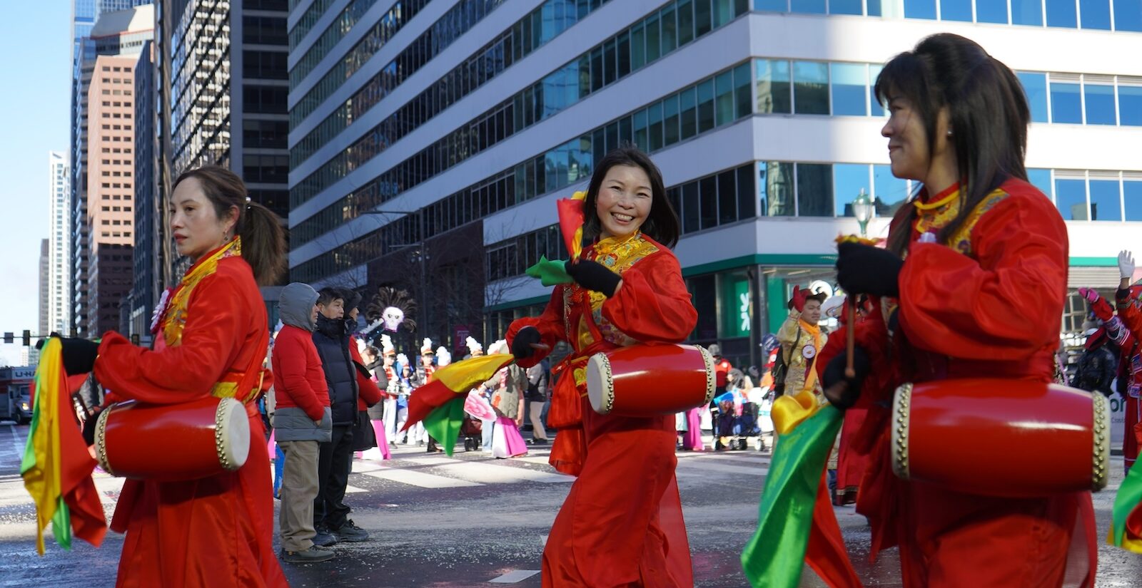 Drummers from the Philadelphia Chinese Community Organizations United finish their Mummer's parade performance in front of City Hall.