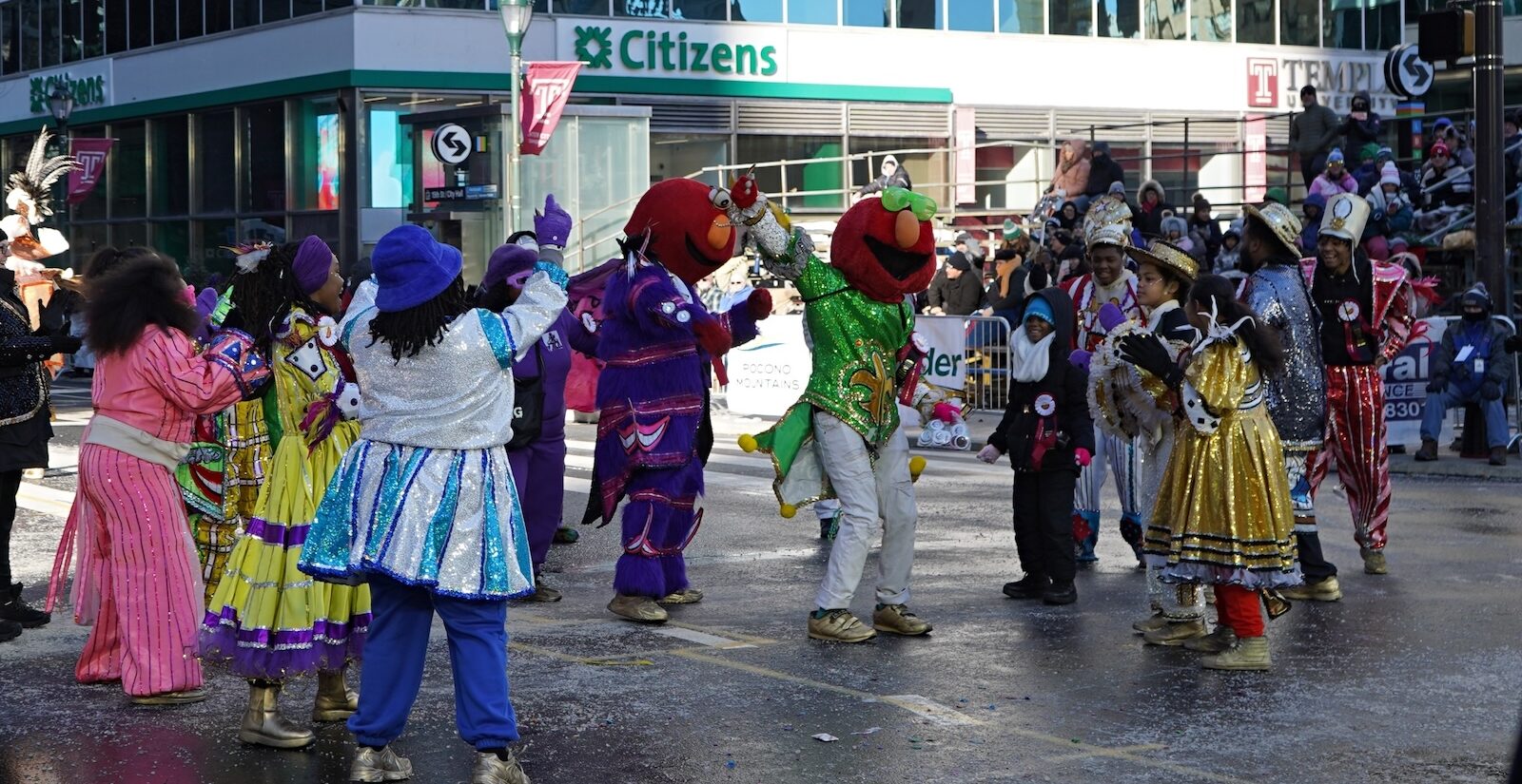 Members of the Positive Movement Entertainment Drumline perform during the 2026 Mummers parade on New Year's Day, led by ''Philly Elmo.''