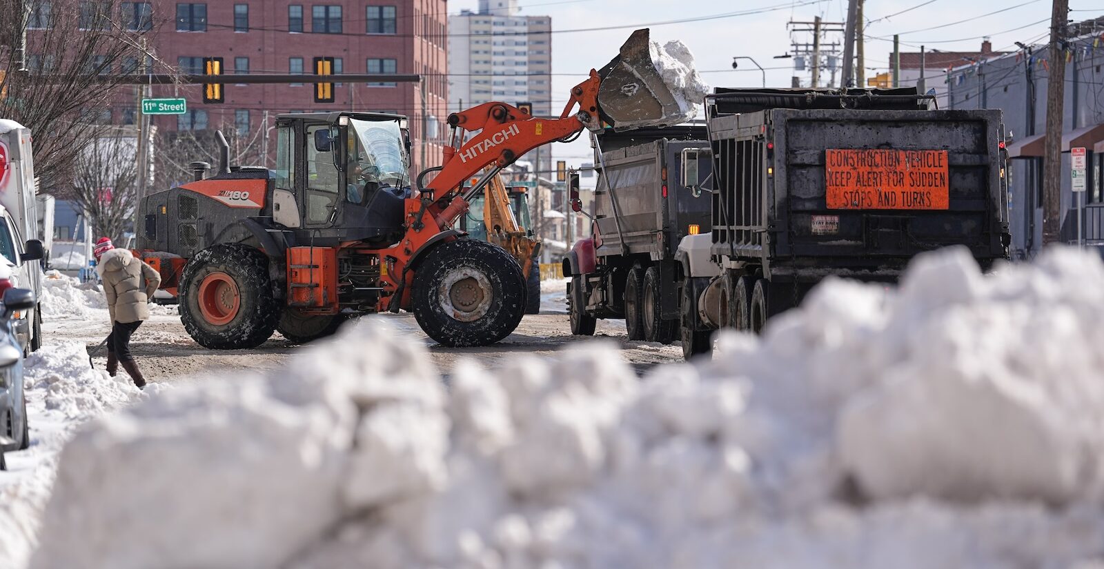 Snow is removed in the aftermath of a winter storm in Philadelphia, Monday, Jan. 26, 2026