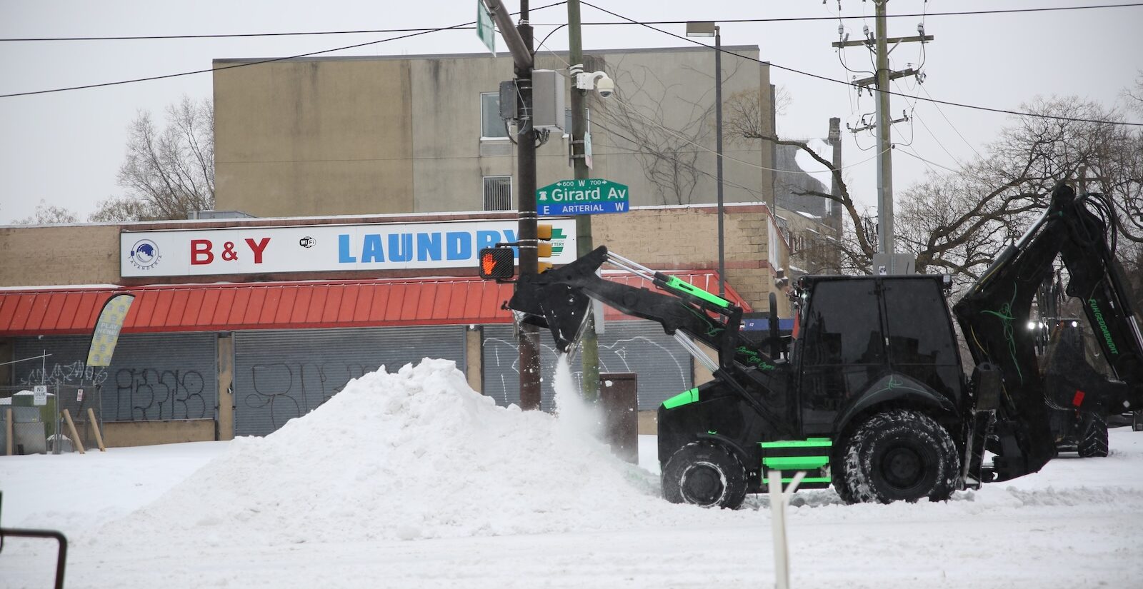 A snow plow is seen operating on Girard Avenue in Philadelphia during a snowstorm on Jan. 25, 2026
