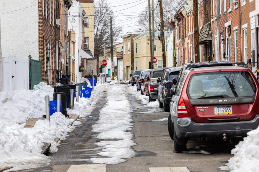 Snow lies in the middle of a side street in Philadelphia