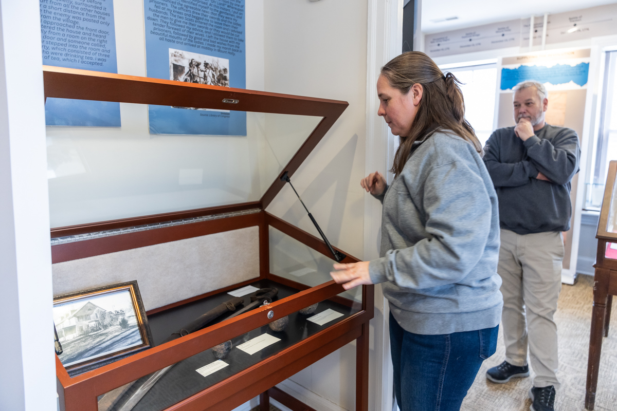 Marisa Bozarth, museum curator of history for Burlington County (left), and Eric Orange, museum attendant for Burlington County inside the Burlington County Joins the Revolution exhibit in the Warden’s House Gallery in Mt. Holly, N.J.