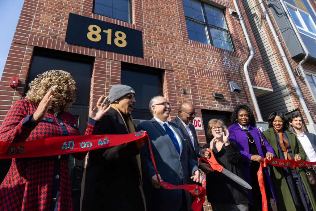 02 11 2026 k paynter hopePHL affordable housing west philly ribbon cutting -6 Many officials cut the ribbon at the outdoor ceremony with oversized scissors