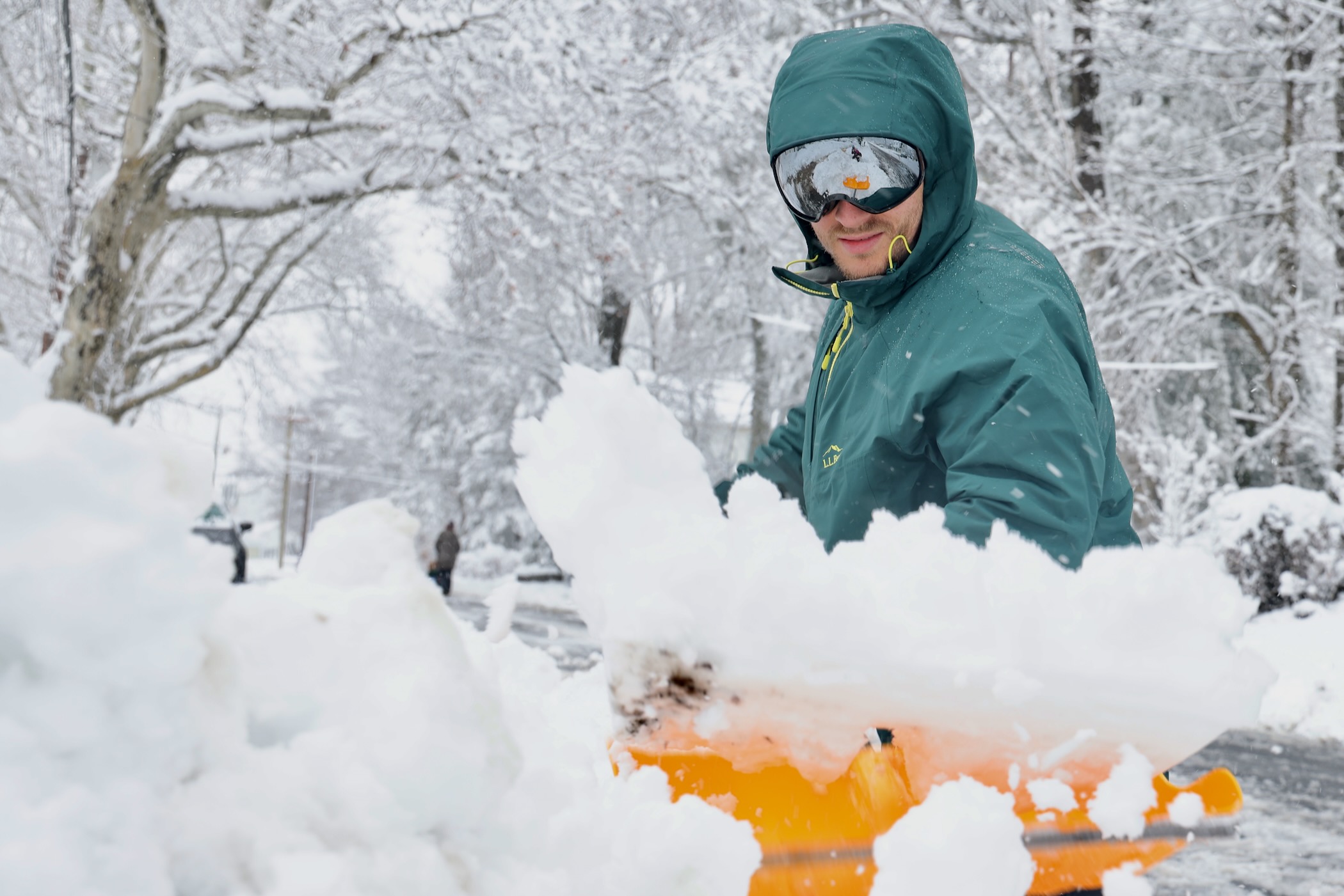 Jake Brickle shoveling his driveway in Moorestown, New Jersey, after a huge snowstorm in Moorestown, New Jersey