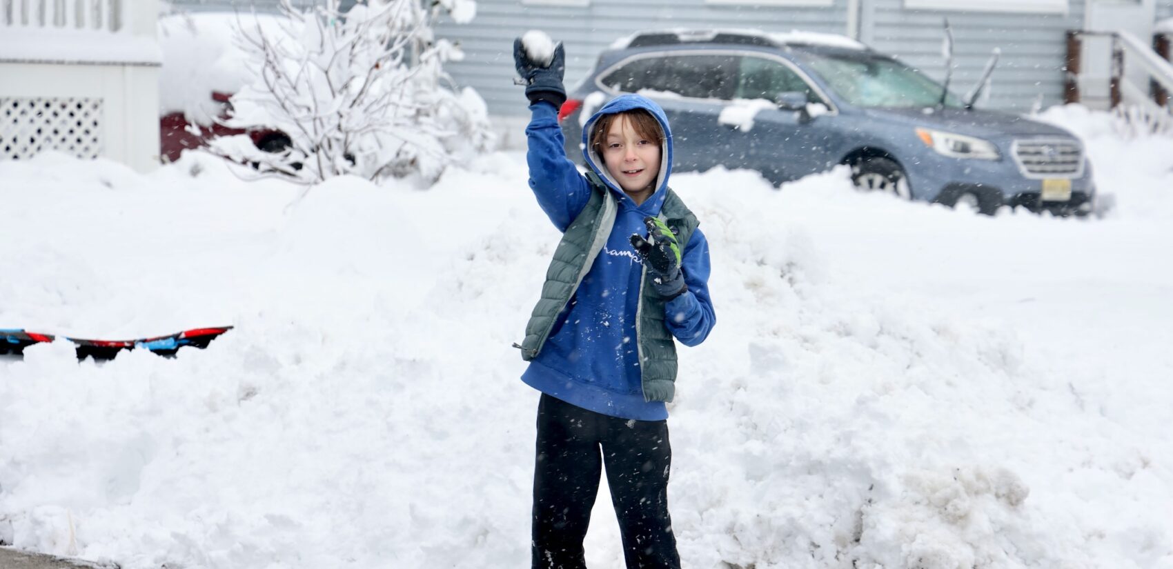 Jesse Motta is in his Moorestown, New Jersey driveway, about to throw a snowball
