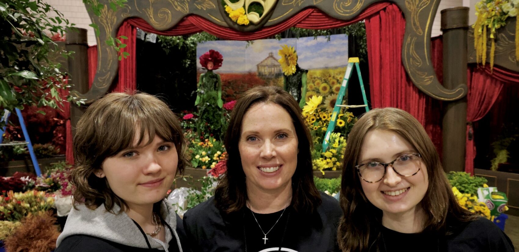 Jennifer Reed and her daughters at the flower show