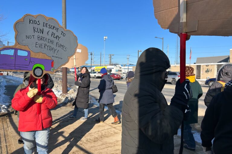 Roughly two dozen protesters rallied at the construction site