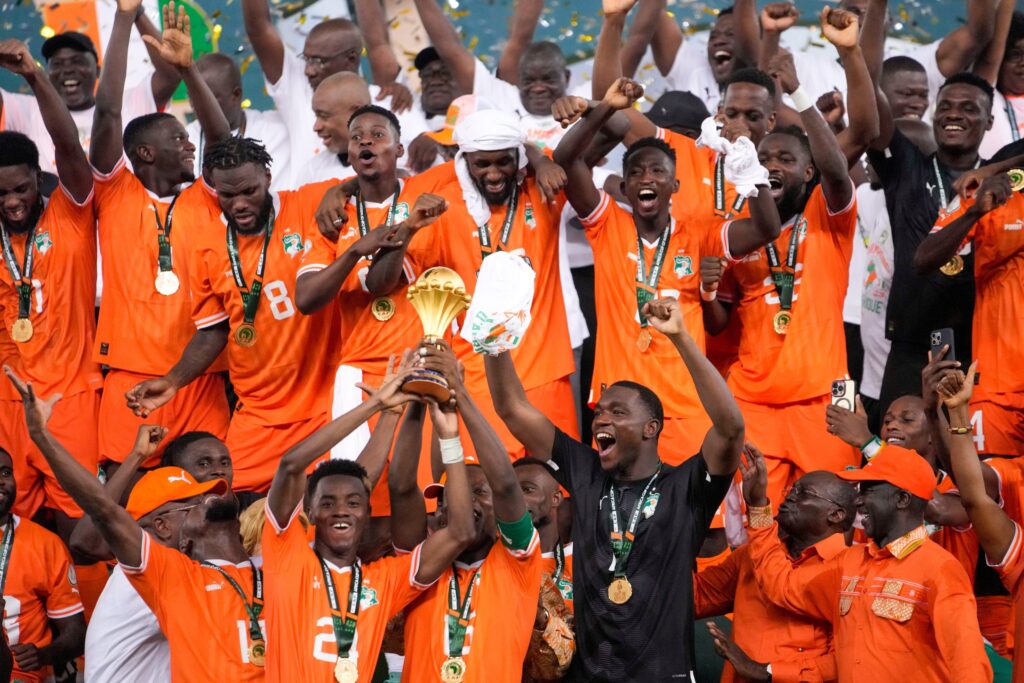FILE - Ivory Coast players celebrate