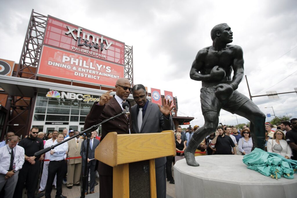 Marvis Frazier, right, son of boxing legend Joe Frazier