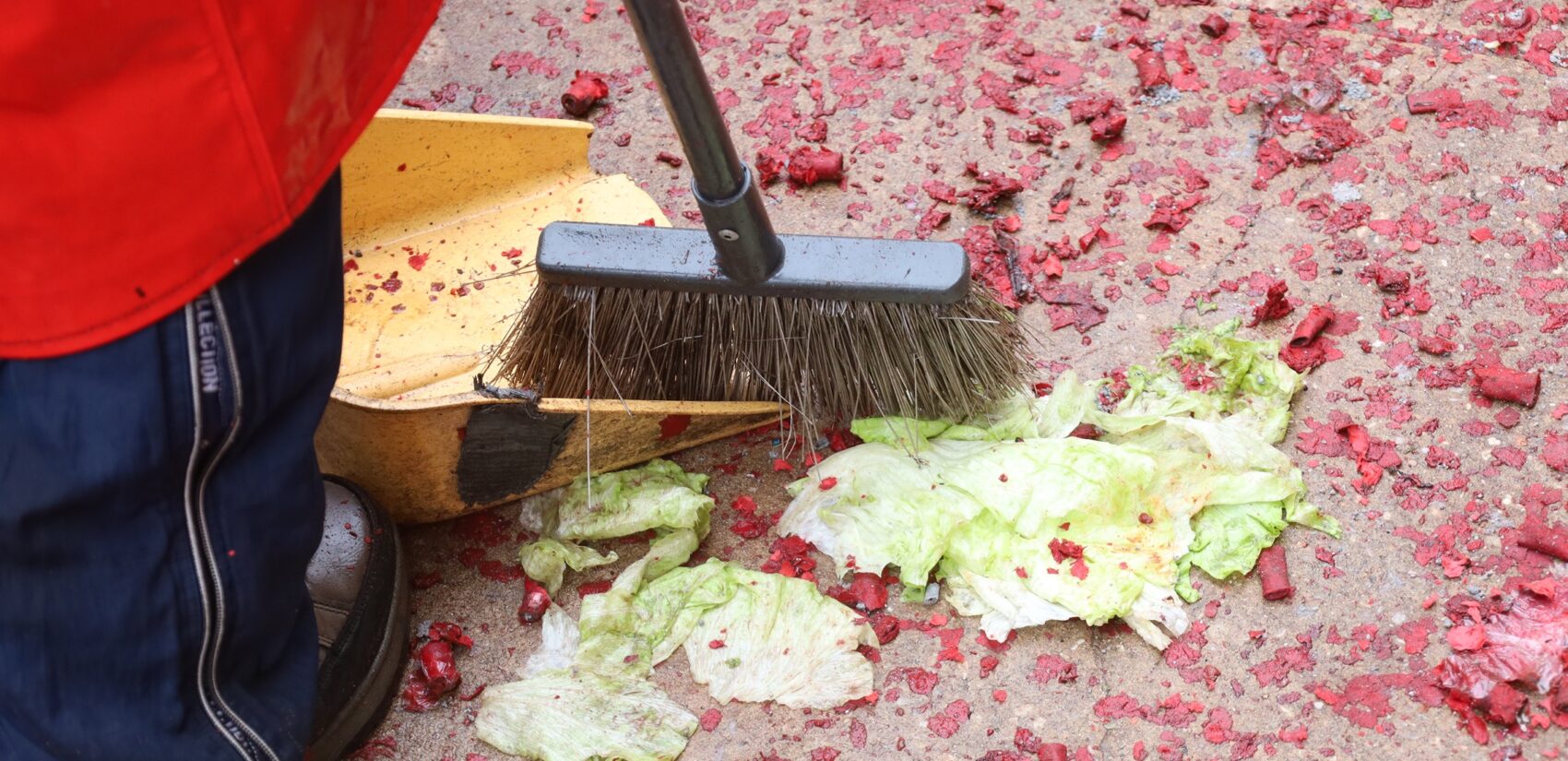 exploded firecrackers being swept