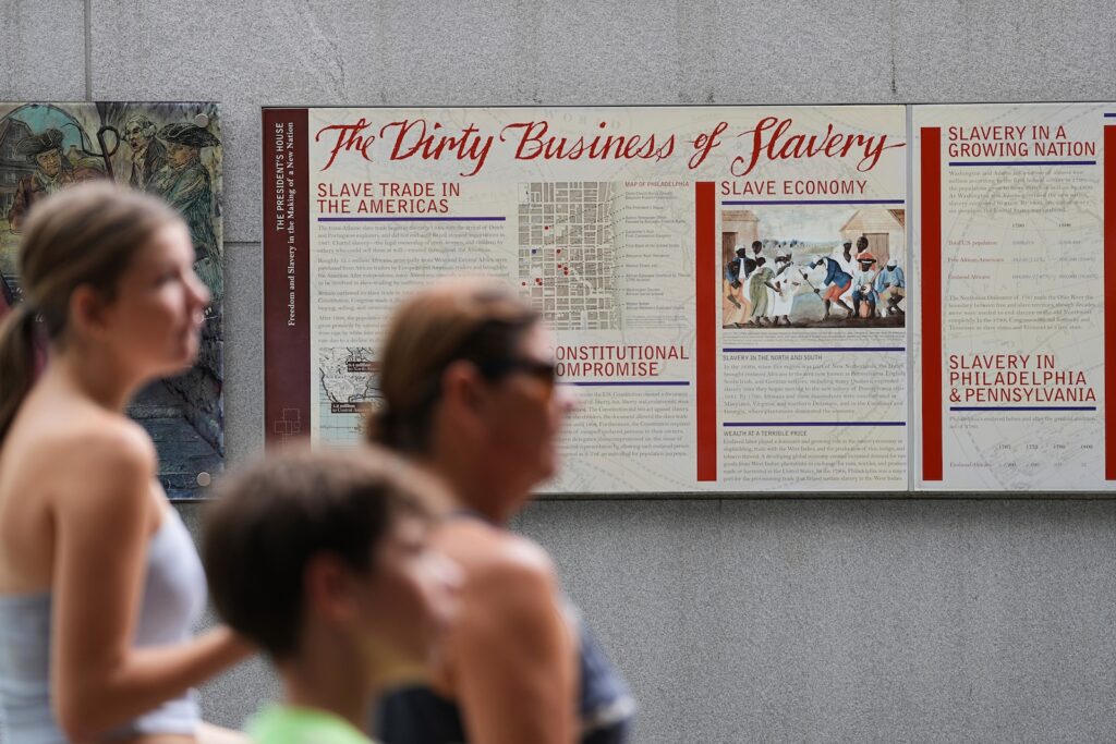 Slavery Exhibit Removed People walk past an informational panel at President's House Site Tuesday, Aug. 19, 2025, in Philadelphia.