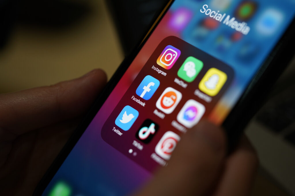 Social media applications A phone with social media apps