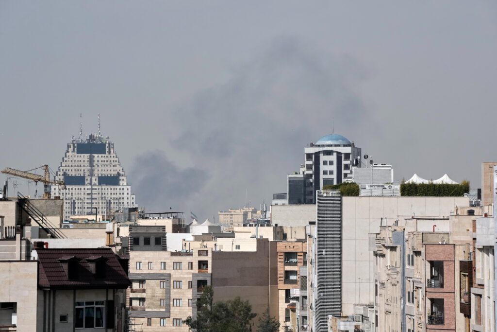 Iran US Israel Smoke can be seen in the background of the downtown skyline in Tehran after an explosion