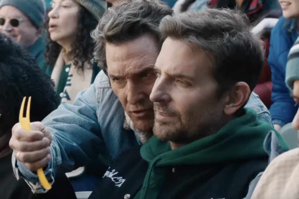 Actors Matthew McConaughey (left) and Bradley Cooper appear in an Uber Eats Super Bowl ad.