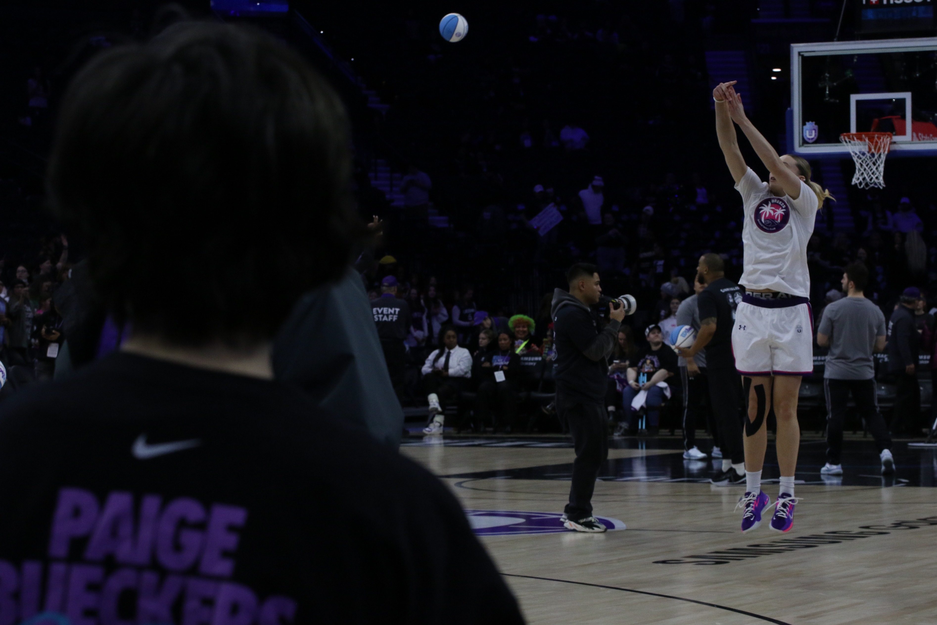Kristina Posne shooting a jumpshot