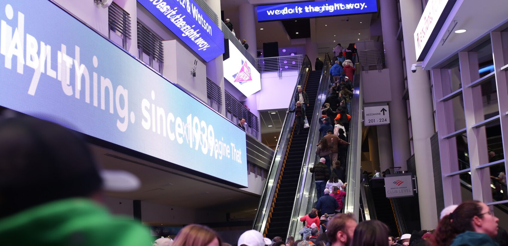 fans on the escalator at Xfinity Mobile Arena