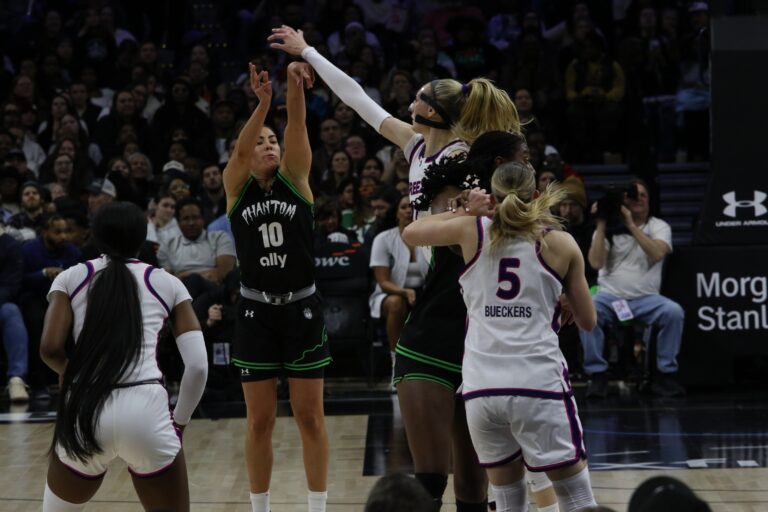 Kelsey Plum shooting a shot