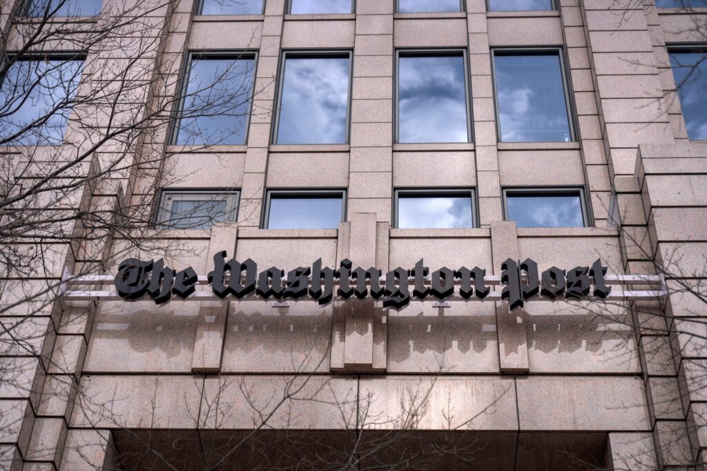 Washington Post A sign above the entrance of the building for the Washington Post