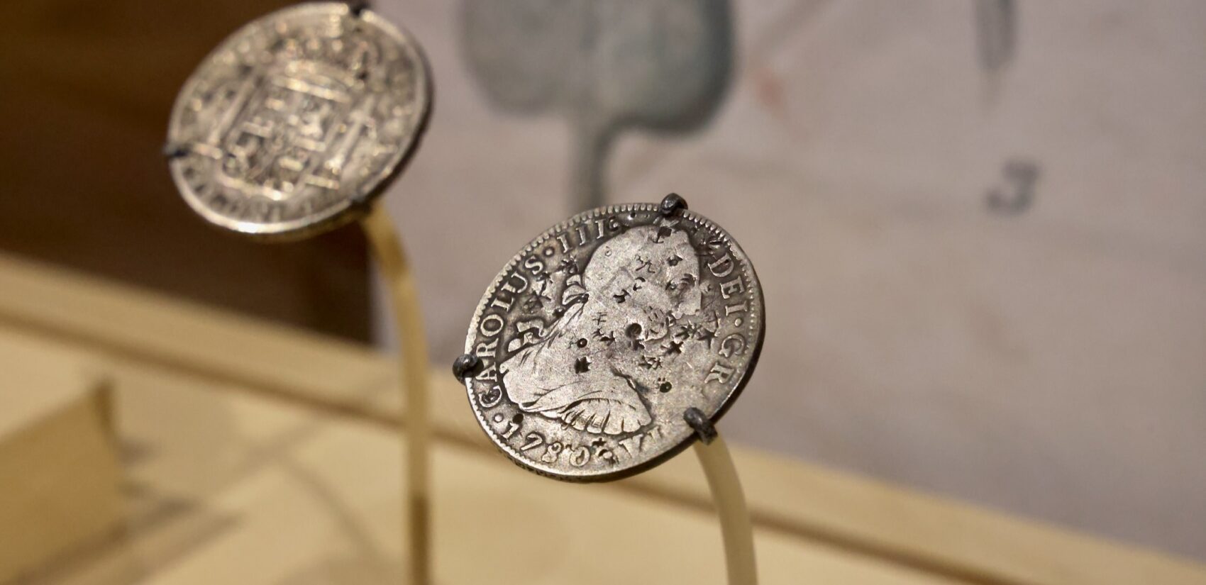 A close-up photo of coins on display at the exhibit