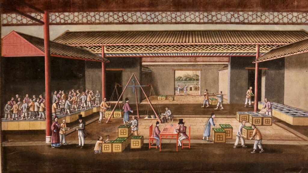 A close-up shot of a painting depicting people trading goods at a market