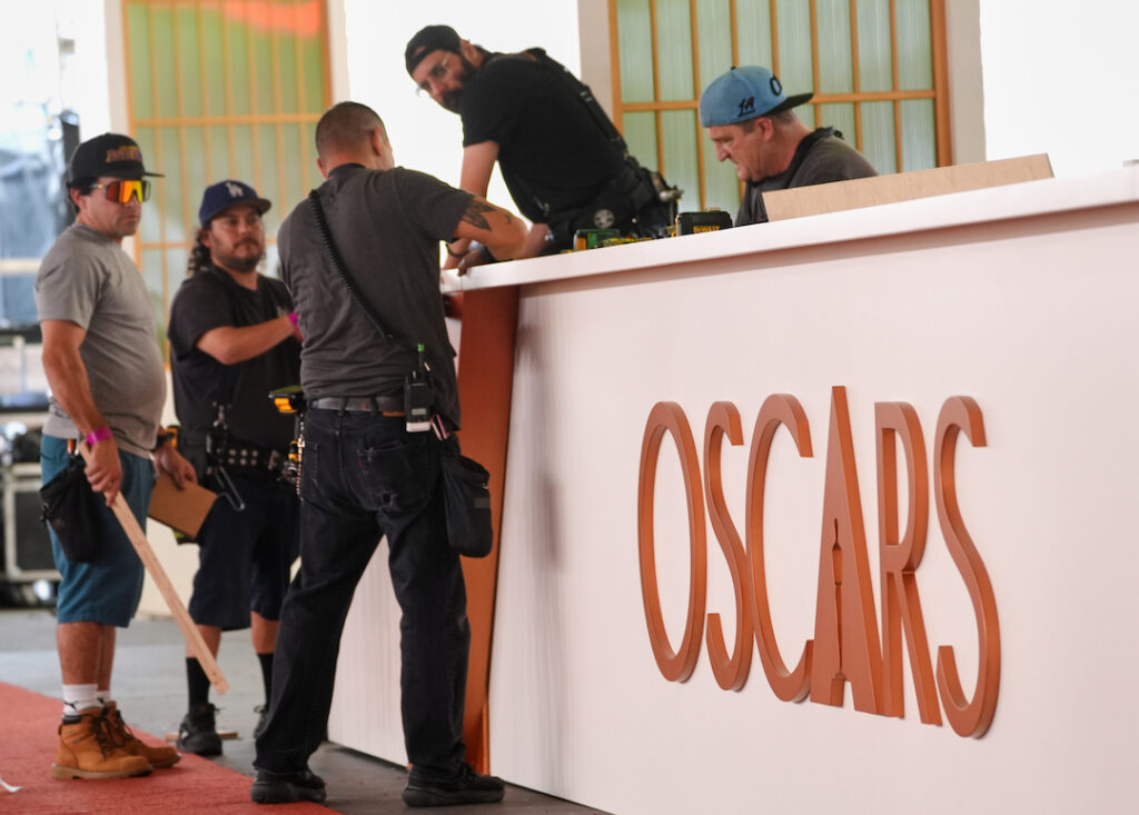 98th Academy Awards Crew members work on a decorative wall near the red carpet for Sunday's Oscars telecast, on Wednesday, March 11, 2026, at the Dolby Theatre in Los Angeles. (AP Photo/Chris Pizzello)