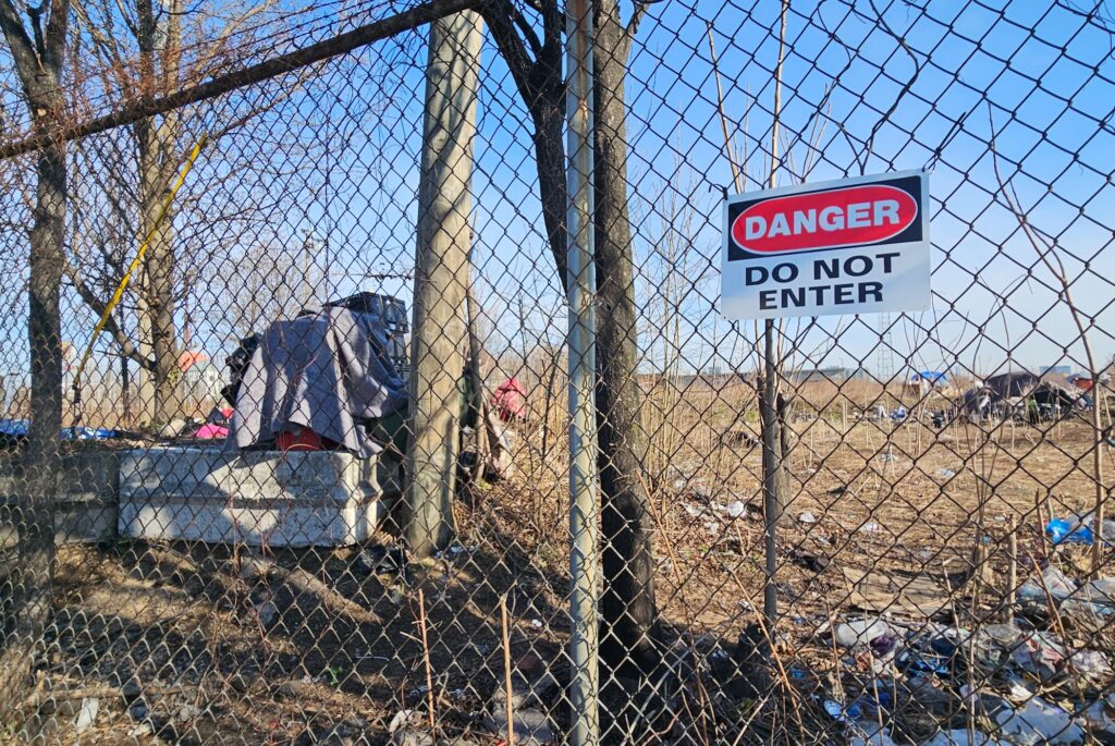 Chloe 2 n-leonard-2026-03-20 A sign on a fence reads Danger Do NOt Enter
