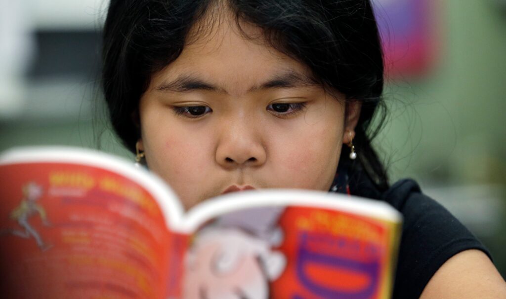 a child reading a book