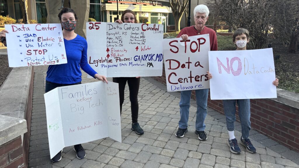 data-center-protesters-sm-031126 Opponents of massive data centers protested
