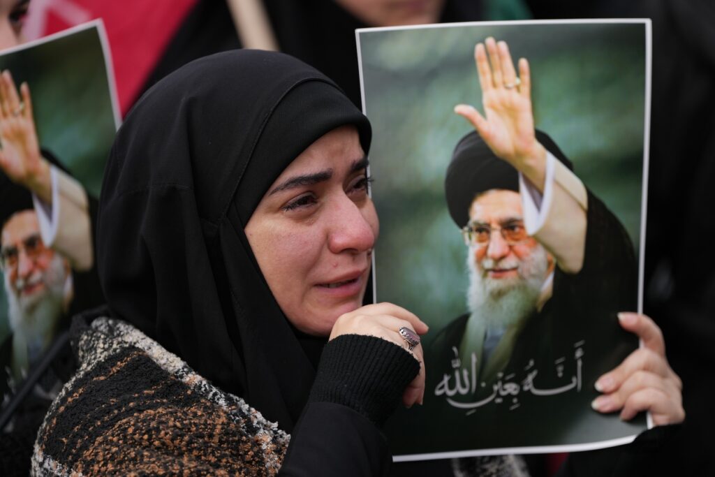 APTOPIX Lebanon Iran US Israel A woman cries as she mourns the death of Iranian Supreme Leader Ayatollah Ali Khamenei