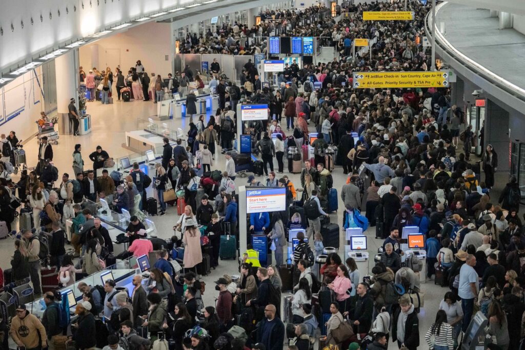 Travel Delays People wait in a TSA line at the John F. Kennedy International Airport
