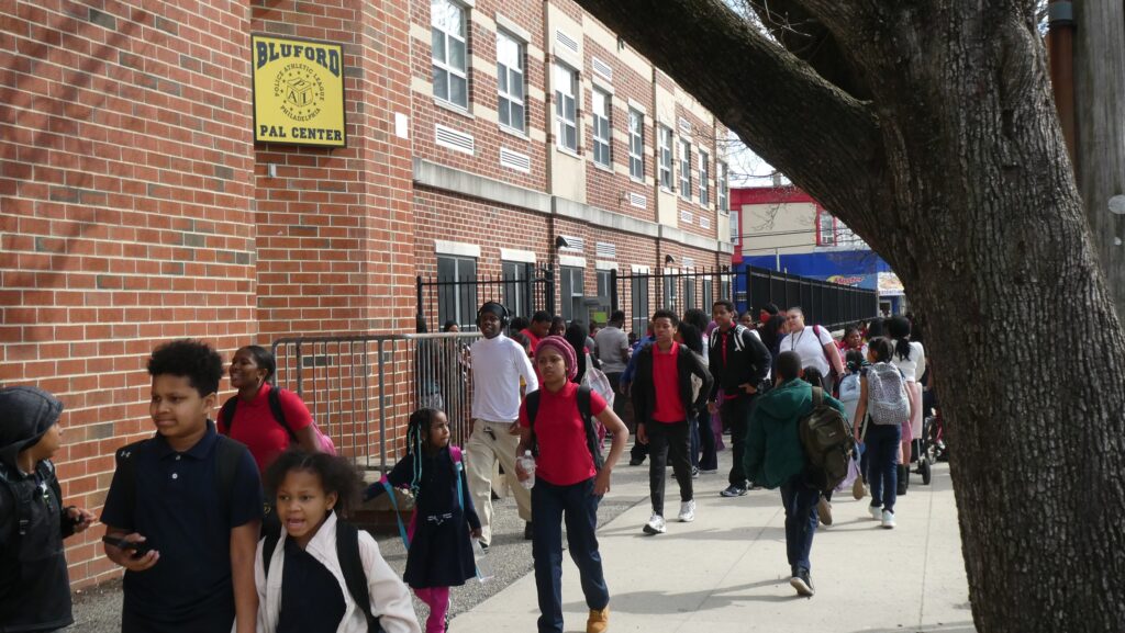 lift-every-voice-2026-03-11-cs-6 Students walking outside Bluford Elementary School