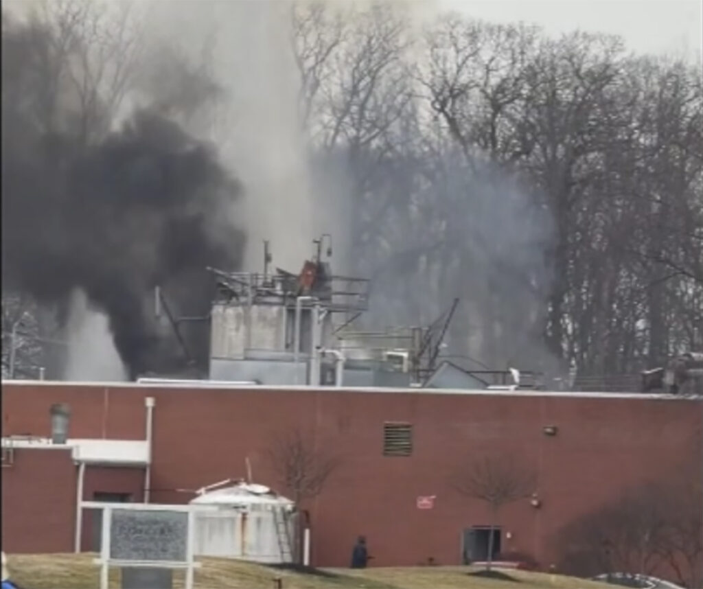 Screenshot Smoke billows from a building that exploded in Logan Township, New Jersey