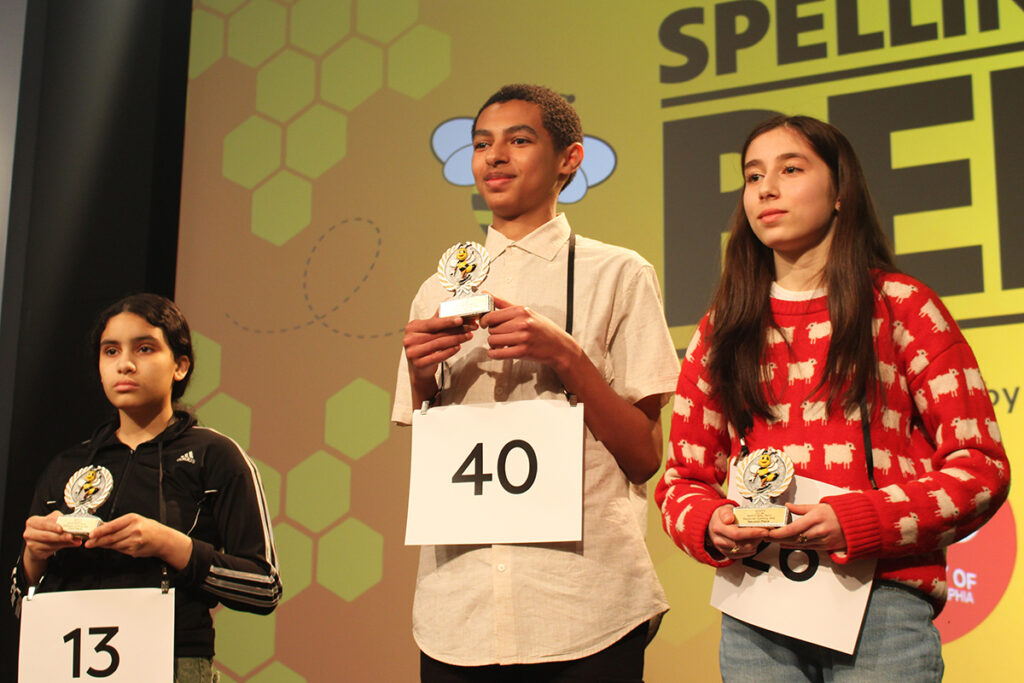 spelling-bee-south-jersey-1-en-030726 Isaac Geremew, center, an eighth grader