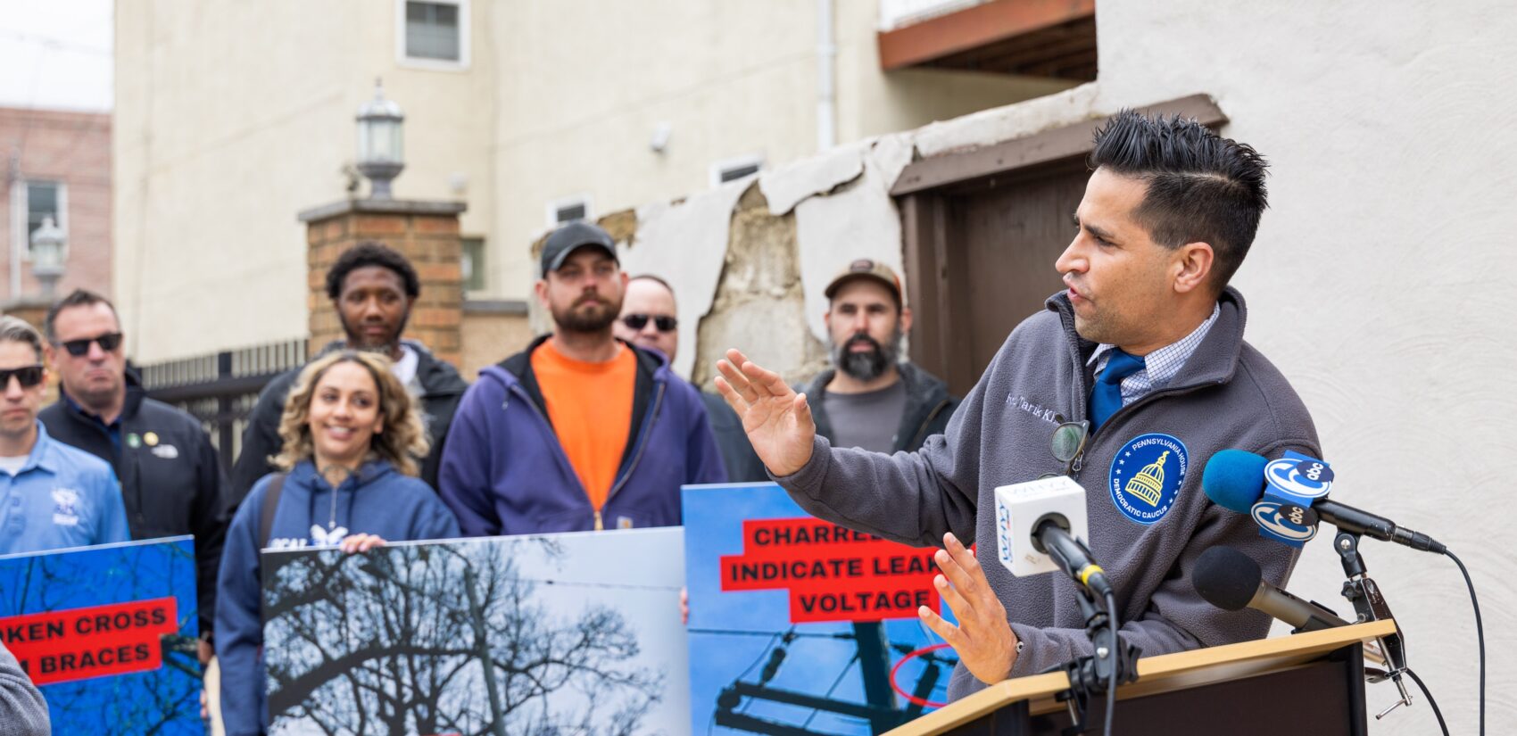 Tarik Khan speaks at a press conference