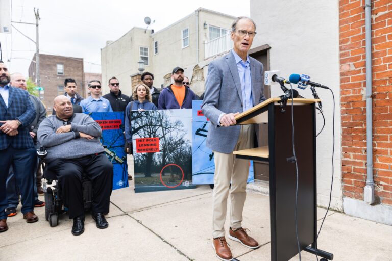 John Kane speaks at a press conference