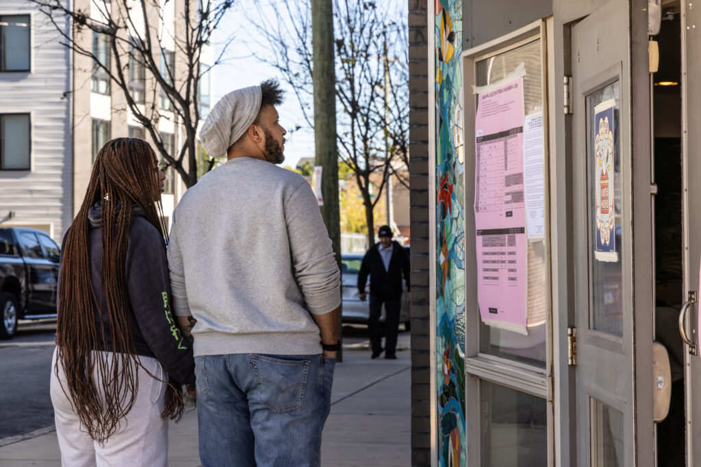 11-4-2025-k-paynter-philly-election-day-nov-25-1 Voters review the ballot before heading into their polling place