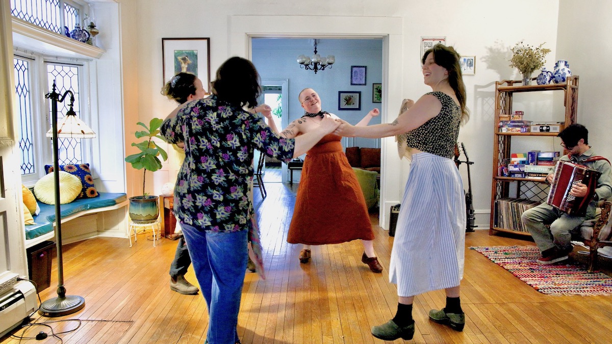 Members of Shtetl Philly dance in a living room
