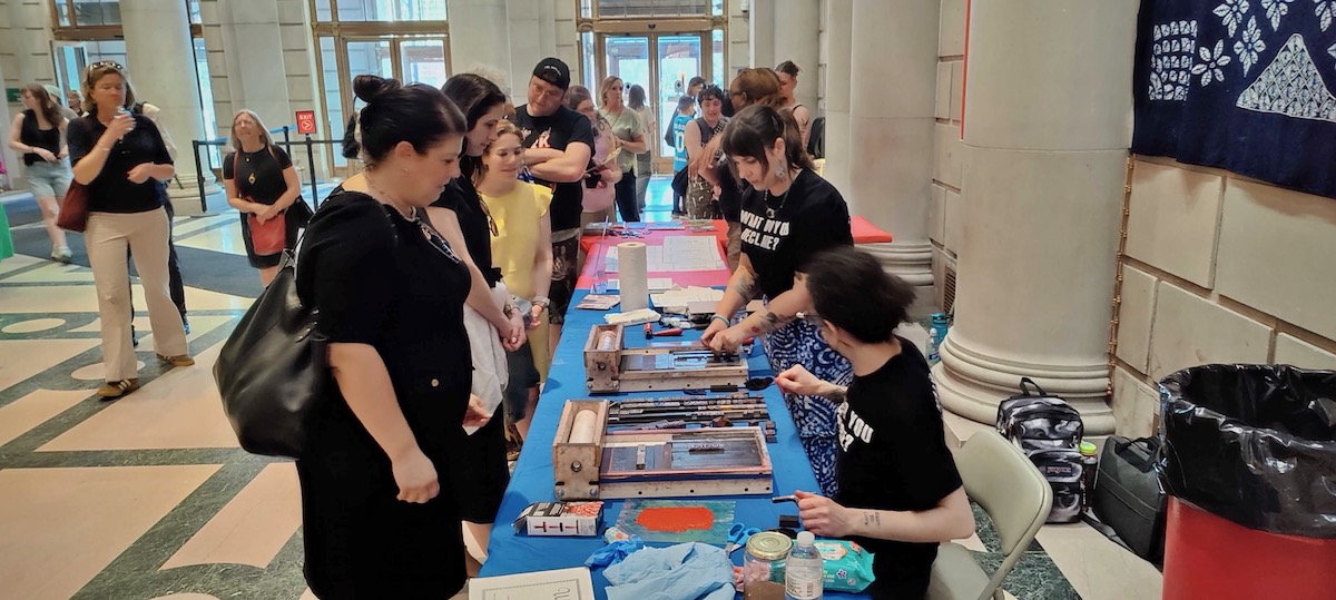 Visitors at the opening of ''Printmaking for the People'' event