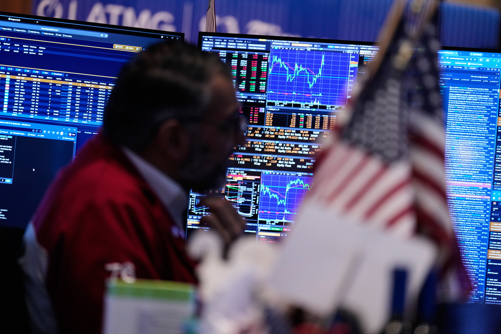 Financial Markets Wall Street Screens display financial information on the floor at the New York Stock Exchange in New York, Tuesday, March 31, 2026. (AP Photo/Seth Wenig)