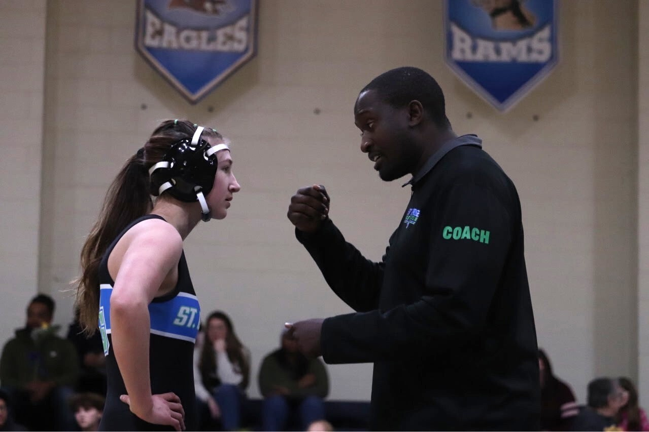 St. Georges Tech coach Eustace Beazer coaches state champ Addison Weismiller