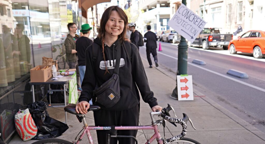 Cyclist Audrey Lee stopped for Philly Bike Action's 