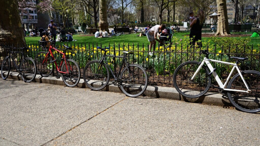 rittenhouse-square-bikes-bp-040626 Bicycles locked up to the fences of Rittenhouse Square Park