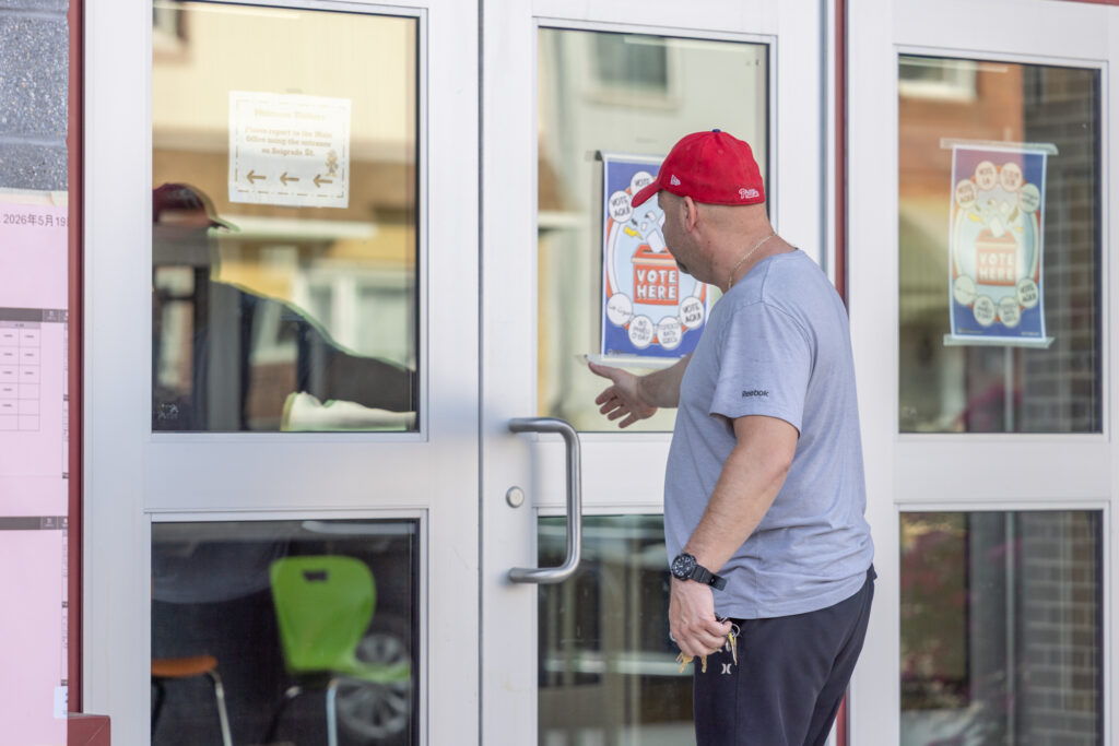 05 19 2026 k paynter primary election file 26-5 A man walks into a polling place on election day