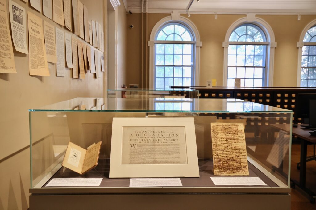 2026 04 30-e lee-philadelphia historical society of pennsylvania-paths to independence declaration Various historical American documents are shown at a display at the Historical Society of Pennsylvania