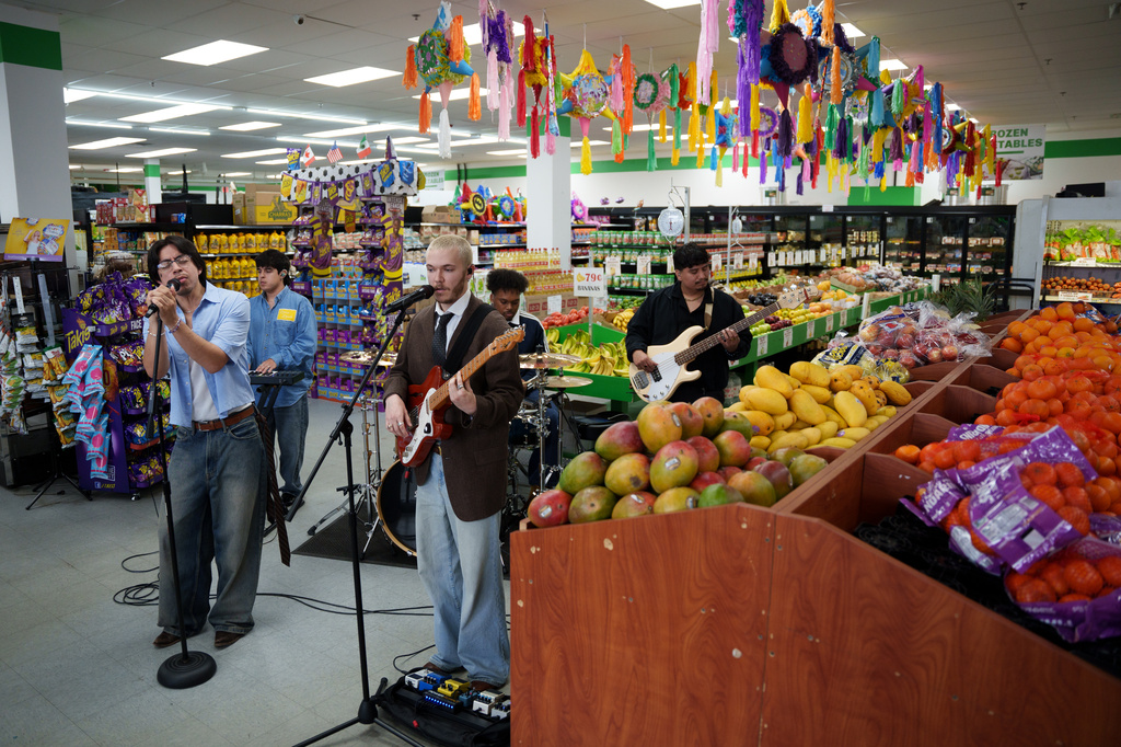 Delaware Grocery Concerts Bilingual alternative pop band Luna Luna performs in the produce section of Fiesta Fresh Market in New Castle, Delaware
