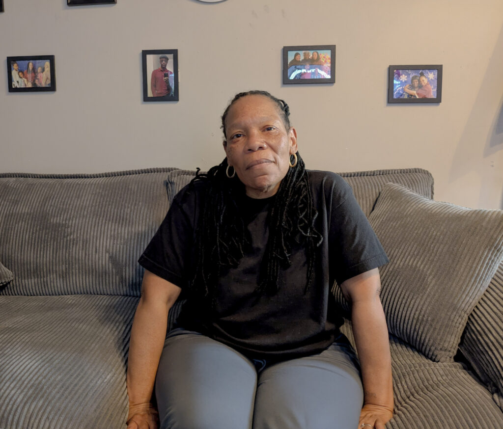 PXL_20260408_205933920 Dannielle Hadley, released from State Correctional Institution Muncy last year, sits in her West Philadelphia home in April 2026. | ASHLEE MOORE