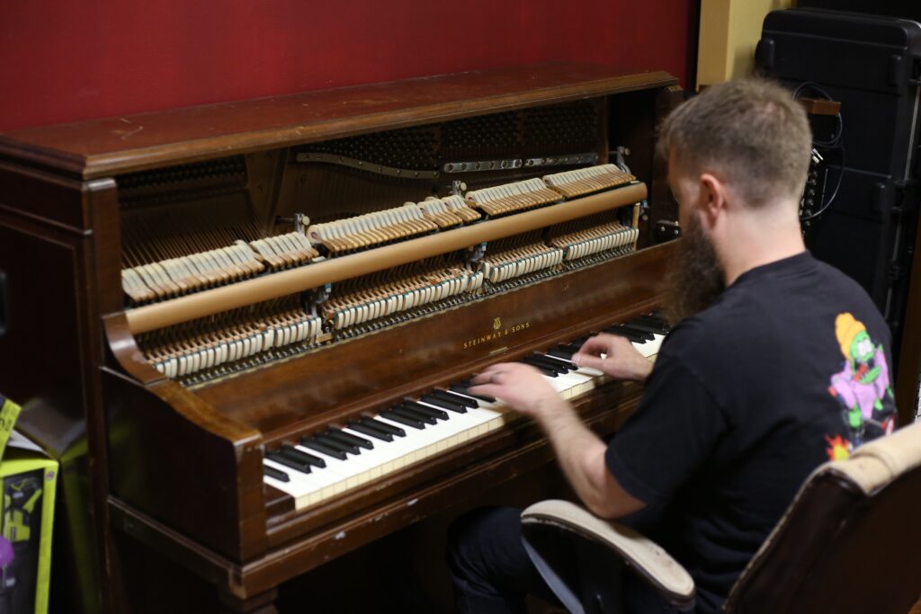 corey-bernhard-2026-cs-6 Corey Bernhard playing piano